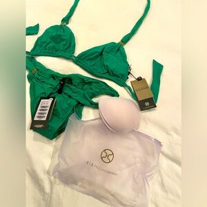 Beautiful green swimsuit with gold detail NWT